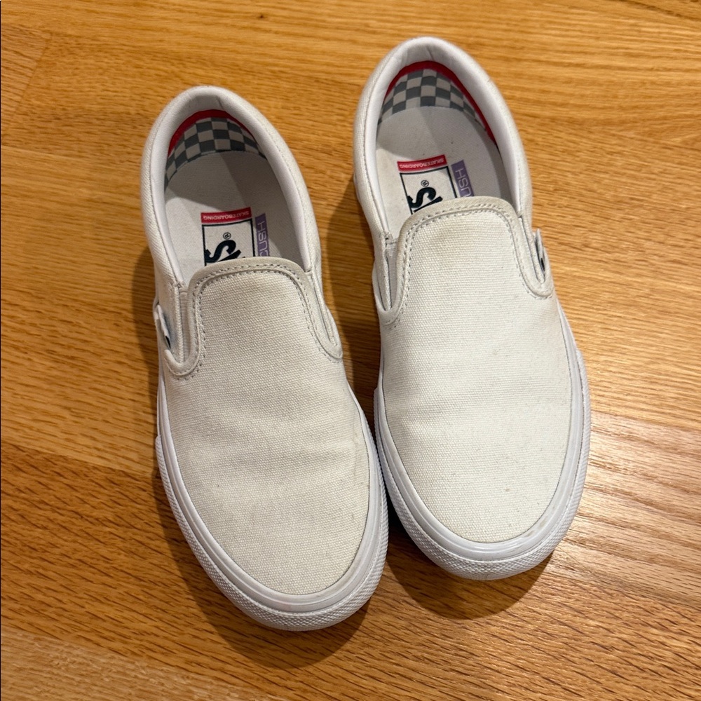 Vans Classic White Canvas Slip-Ons